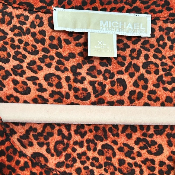 Michael Kors orange and black leopard print shirt. - Picture 4 of 4